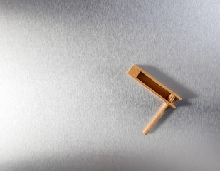 wooden noisemaker or rattle for concept of waking up business