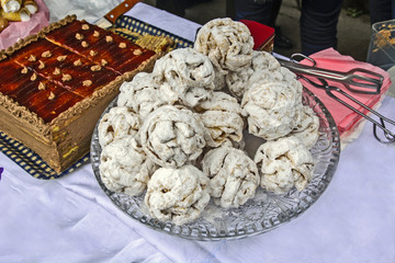 Small cakes and a big cake