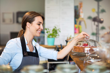 Woman working in coffee shop

