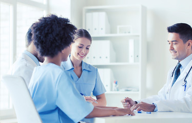 Fototapeta premium group of happy doctors meeting at hospital office