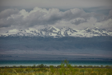 Mountain tops and Issykkul lake in Kyrgyzstan