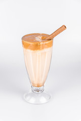 Latte with whipped cream on isolated white background