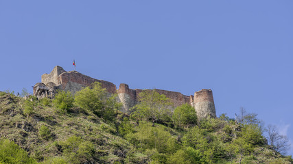 Fototapeta na wymiar Bottom view of Poenari Castle in ruined castle in Romania which was a home of Vlad the Impaler, on a sunny day