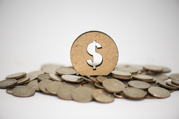 Wooden sign with coin. Investment concept