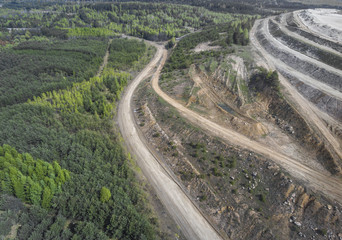 Aerial view over the building materials processing factory. Sand mine. View from above.