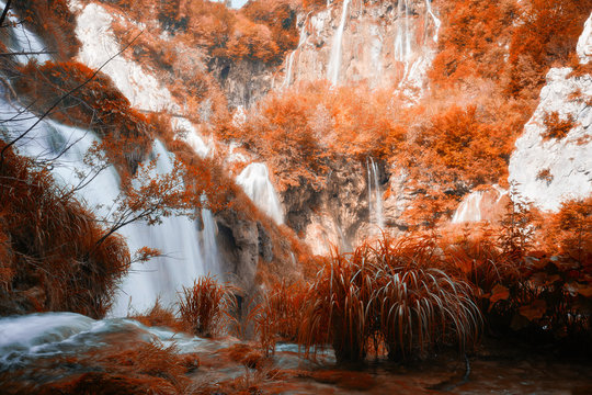 Beautiful autumn color forest waterfall © Nickolay Khoroshkov