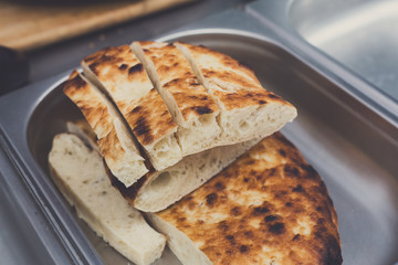 Freshly baked pitas at country fair outdoors