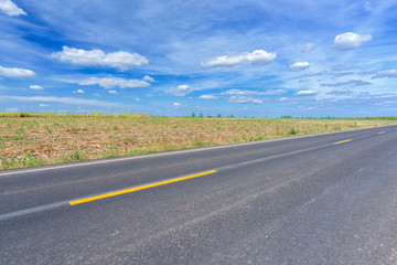 Fototapeta premium Asphalt road and countryside views
