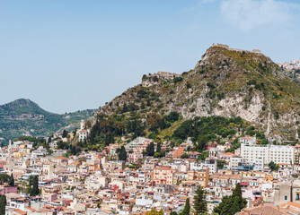 Fototapeta premium Cityscape of Taormina with Etna, Sicily, Italy