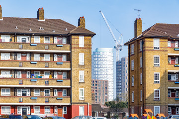 Council housing blocks in contrast to modern tower block flats 