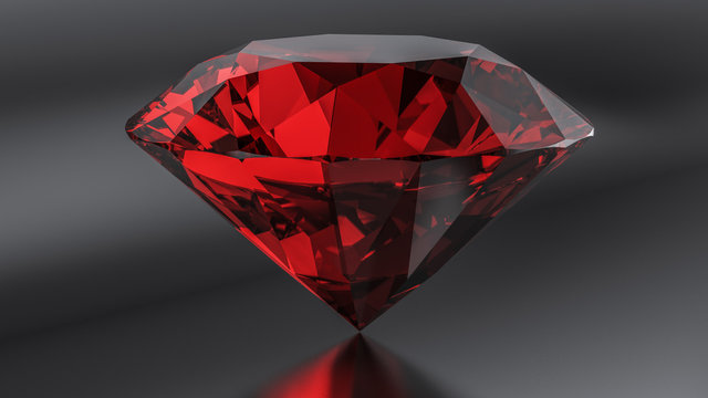 Ruby diamond on the dark background.