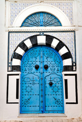 Arched Doorway with Blue Studded Door, Africa, North Africa, Tunisia, Sidi Bou Said