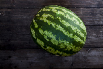 watermelon on a dark wooden background