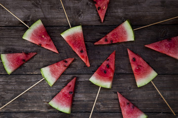 watermelon on a dark wooden background