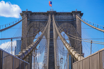 Obraz premium Brooklyn Bridge New York - a famous landmark- MANHATTAN / NEW YORK - APRIL 1, 2017