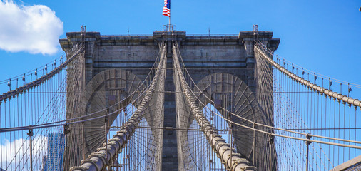 Fototapeta premium Brooklyn Bridge New York - a famous landmark- MANHATTAN / NEW YORK - APRIL 1, 2017