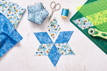 Prepare of diamond pieces of fabric for sewing quilt, top view