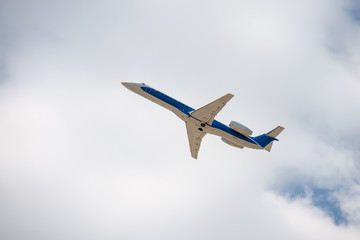 aircraft flies in the  sky view from below