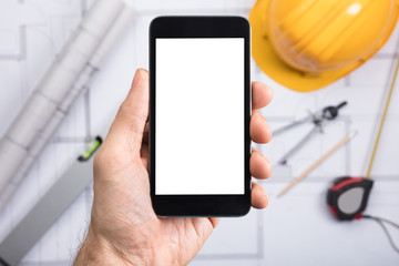 An Engineer Holding Cell Phone