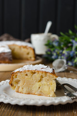 Apple vegan pie with coffee and snowdrops