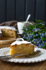 Apple vegan pie with coffee and snowdrops