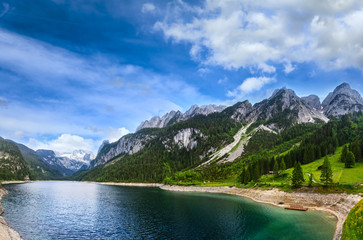 Fototapeta na wymiar Alpine summer lake panorama.