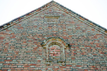 part of the brick wall of the building