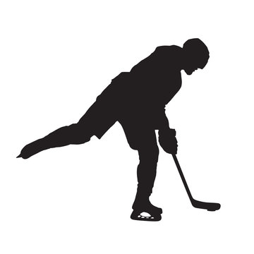 Ice hockey player shooting, vector isolated silhouette