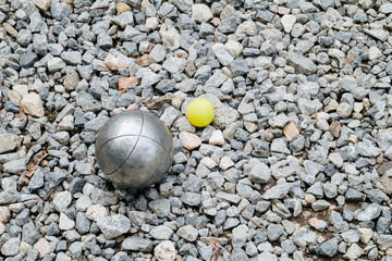 Petanque ball and the yellow wood jack