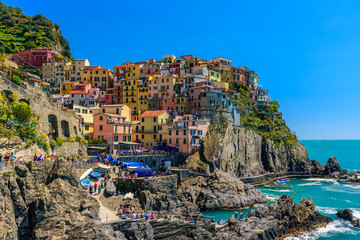 Fototapeta na wymiar View of some houses of the famous town of Manarola inside the Cinque Terre National Park.