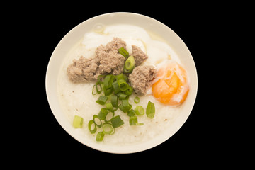 Porridge, eggs, pork chops, Traditional thai porridge rice gruel, tasty food.