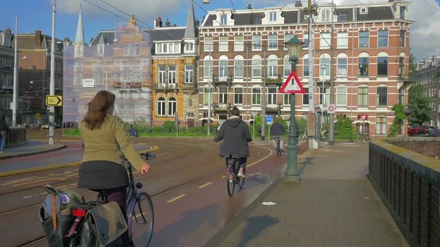 City traffic on Amsterdam street, Holland, 4k UHD
