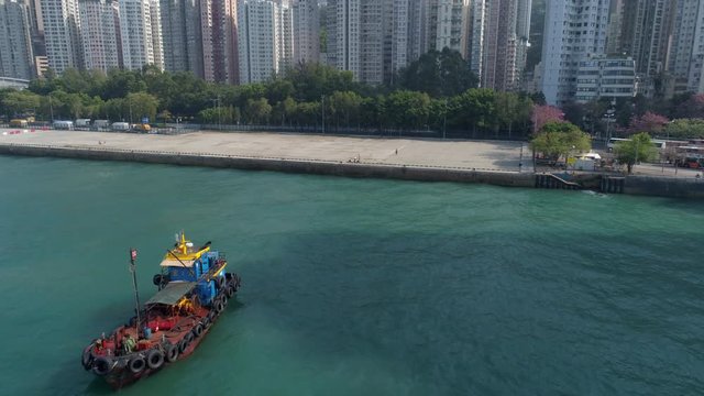 hong kong city bay sunny day victoria harbour boat ride aerial panorama 4k china
