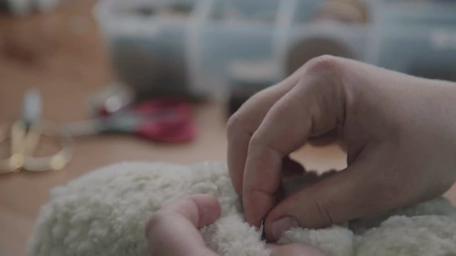 Process of creating a soft handmade toy. Work details: craft toy in the old-fashioned style. Teddy bear as in the 20th century - fashionable collectible toys. Beige teddy bear: process of creation.
