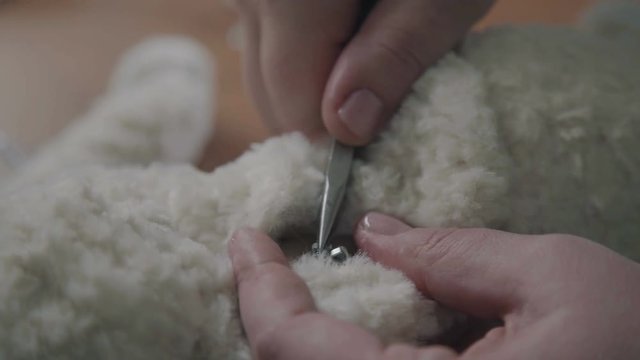 Process of creating a soft handmade toy. Work details: craft toy in the old-fashioned style. Teddy bear as in the 20th century - fashionable collectible toys. Beige teddy bear: process of creation.
