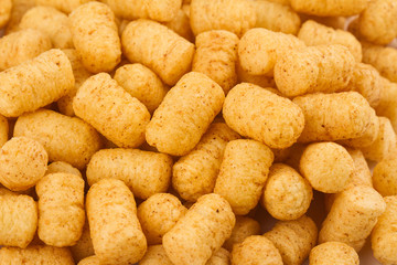 top view of corn puff snacks pile texture