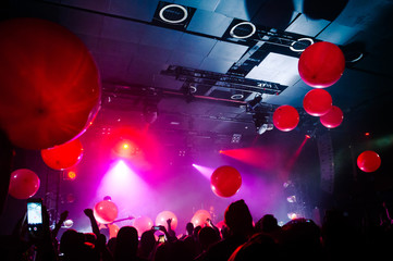 Fototapeta na wymiar Balloons flying over the crowd during the concert