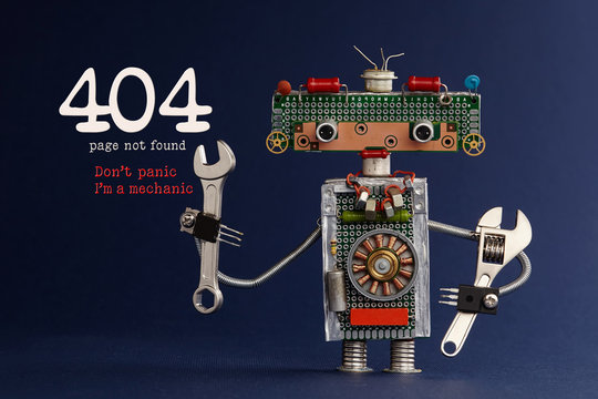 404 error page not found concept. Don't panic I'm a mechanic. Hand wrench adjustable spanner robot handyman on dark blue paper background. Cute robotic toy made of electronic circuits, chip capacitors