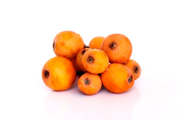 medlar or loquat fruits isolated on a white background