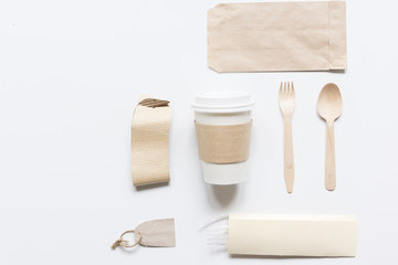 paper bags and plastic cup for take away set top view space for text