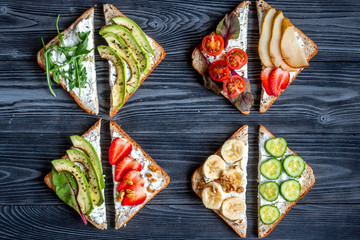 healthy breakfast with sandwiches set on white background top view