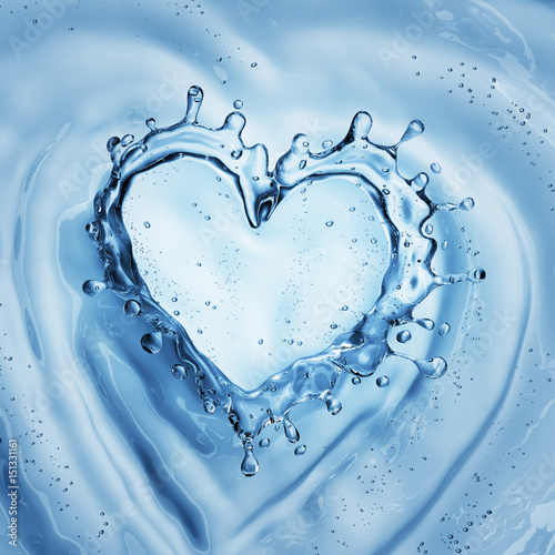 Heart From Water Splash With Bubbles On Blue Water Background Stock