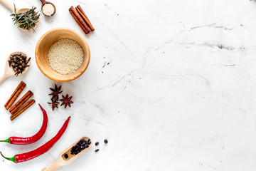 Cooking with spices, vanilla, cinnamon on kitchen table background top view mock-up