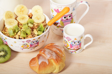 Croissant with muesli for a quick breakfast for children