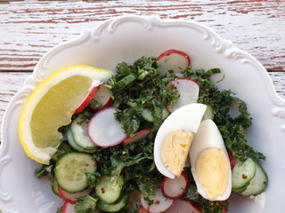 Mixed salad from cabbage kale, cucumber and radish.