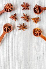 Dry colorful spices, vanilla on kitchen light table background top view mockup