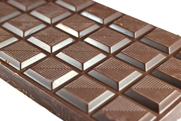 Close-up of Dark Chocolate Bar Isolated on White Background with Selective Focus