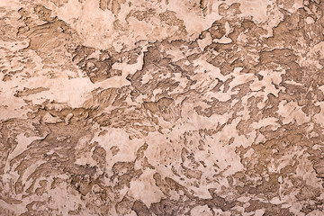 brown textured clay with a relief pattern for interior decorating