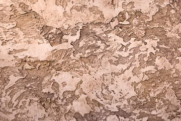 Fototapete Alte schmutzige strukturierte Wand brauner strukturierter Ton mit Reliefmuster für die Innendekoration