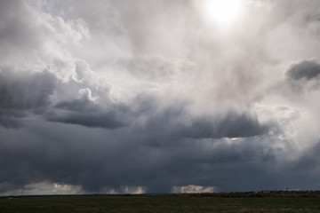 Obraz na płótnie Canvas Dramatic cloudy sky at the airfield